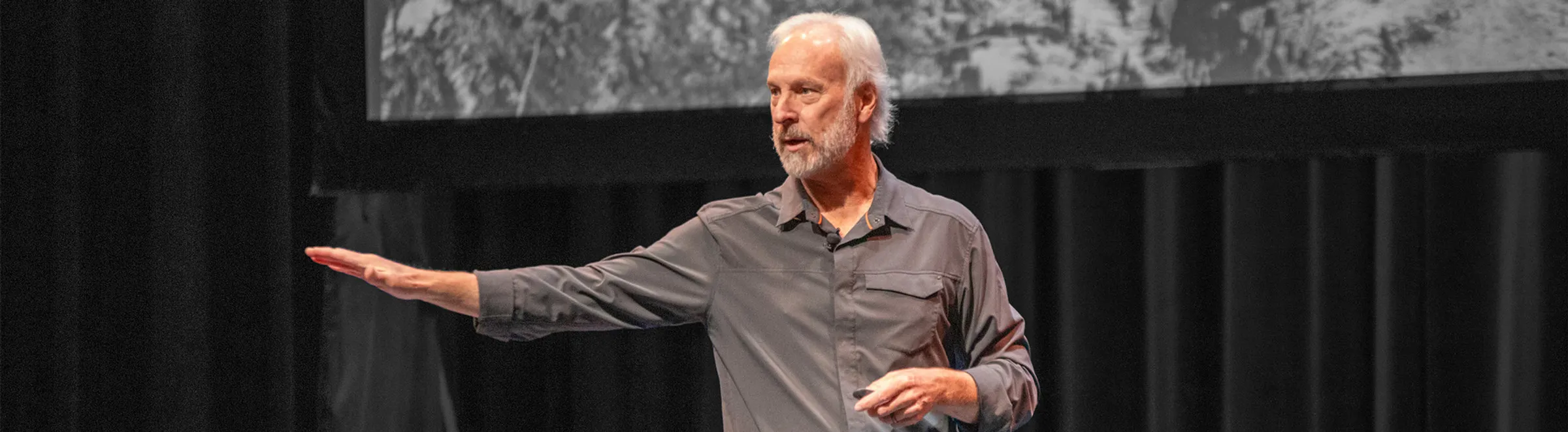 Dan Schilling speaking on stage